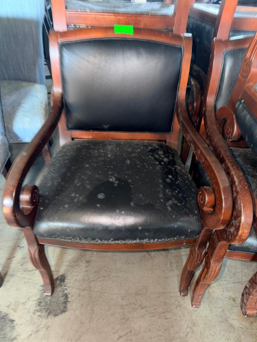 (6) MATCHING WOOD FRAME ARMCHAIRS WITH BLACK PADDED UPHOLSTERED SEATS AND BACKRESTS, CURVED WOOD ARMS, DECORATIVE SCROLL ACCENTS, AND DARK CHERRY FINISH