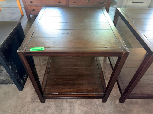 (2) MATCHING DARK WOOD END TABLES WITH RECTANGULAR PLANK-STYLE TOPS, LOWER SHELVES, STRAIGHT LEGS, AND DARK BROWN FINISH.