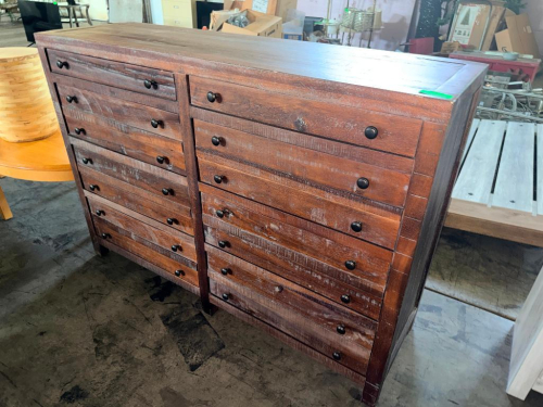 60" LARGE RUSTIC WOOD DOUBLE DRESSER WITH (12) DRAWERS, DISTRESSED MEDIUM-BROWN FINISH, BLACK ROUND KNOB HARDWARE, AND HEAVY WOOD FRAME CONSTRUCTION.