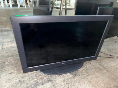 ELEMENT ELECTRONICS FLAT SCREEN LCD TELEVISION WITH BLACK CABINET AND PEDESTAL BASE.