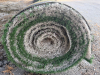 7.5' W X 40' L ARTIFICIAL TURF / ASTROTURF WITH GREEN SYNTHETIC GRASS SURFACE AND WOVEN BACKING. TURF IS ROLLED FOR STORAGE AND SHOWS VISIBLE DIRT, WEAR, FRAYING, AND RESIDUE CONSISTENT WITH PREVIOUS INSTALLATION AND REMOVAL. - 2