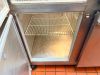 MCCALL FOUR-DOOR COMMERCIAL REACH-IN REFRIGERATOR WITH STAINLESS STEEL EXTERIOR, FOUR SOLID HINGED DOORS, ADJUSTABLE WIRE SHELVING, TOP-MOUNTED REFRIGERATION SYSTEM, AND BUILT-IN TEMPERATURE GAUGE - 5