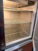 MCCALL FOUR-DOOR COMMERCIAL REACH-IN REFRIGERATOR WITH STAINLESS STEEL EXTERIOR, FOUR SOLID HINGED DOORS, ADJUSTABLE WIRE SHELVING, TOP-MOUNTED REFRIGERATION SYSTEM, AND BUILT-IN TEMPERATURE GAUGE - 6