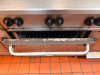 VULCAN COMMERCIAL SIX-BURNER NATURAL GAS RANGE WITH STANDARD OVEN BASE, HEAVY-DUTY CAST IRON OPEN-TOP GRATES, INDIVIDUAL BURNER CONTROLS, STAINLESS STEEL FRONT, BACKSPLASH, OVEN RACK, AND CASTERS. - 2