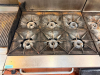 VULCAN COMMERCIAL SIX-BURNER NATURAL GAS RANGE WITH STANDARD OVEN BASE, HEAVY-DUTY CAST IRON OPEN-TOP GRATES, INDIVIDUAL BURNER CONTROLS, STAINLESS STEEL FRONT, BACKSPLASH, OVEN RACK, AND CASTERS. - 2