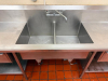 14' L X 28" D STAINLESS STEEL COMMERCIAL WORKTABLE AND TWO-COMPARTMENT SINK ASSEMBLY WITH INTEGRAL BACKSPLASH, LARGE WORK SURFACES, TWO DEEP SINK COMPARTMENTS, WALL-MOUNT FAUCET, TWO DRAWERS, LOWER STAINLESS STEEL STORAGE SHELVES, AND TUBULAR LEGS. - 3
