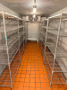 27' X 18' THREE-COMPARTMENT WALK-IN REFRIGERATION SYSTEM CONSISTING OF TWO COOLER SECTIONS AND ONE FREEZER SECTION WITH INSULATED PANEL CONSTRUCTION, THREE HINGED ACCESS DOORS, INTERIOR LIGHTING, DIAMOND-PLATE FLOORING IN FREEZER SECTION, MULTIPLE EVAPORA - 5