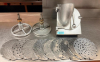 COMMERCIAL VEGETABLE SLICER / SHREDDER ATTACHMENT WITH CAST METAL HOUSING, HINGED FEED HOPPER, PUSHER ASSEMBLY, (2) DRIVE/PLATE HOLDERS, AND ASSORTED INTERCHANGEABLE SLICING, SHREDDING, AND GRATING DISCS.