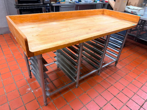 71" W X 29" D HARDWOOD BUTCHER BLOCK WORK TABLE WITH THICK SOLID WOOD WORK SURFACE, THREE-SIDED RAISED WOOD SPLASH, AND STAINLESS STEEL UNDERSHELF PAN RACK FRAME.