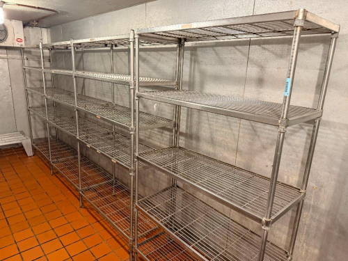 (4) 42" X 18" SECTIONS OF HEAVY-DUTY WIRE SHELVING SYSTEM CONSISTING OF MULTIPLE CONNECTED SHELVING SECTIONS WITH SHARED VERTICAL POSTS BETWEEN ADJOINING SECTIONS. OPEN WIRE SHELVES WITH ADJUSTABLE SPLIT-SLEEVE POST COLLARS