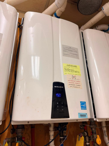 COMMERCIAL WALL-MOUNTED CONDENSING TANKLESS WATER HEATER WITH DIGITAL TEMPERATURE DISPLAY, FRONT-MOUNTED CONTROLS AND ENERGY STAR RATING