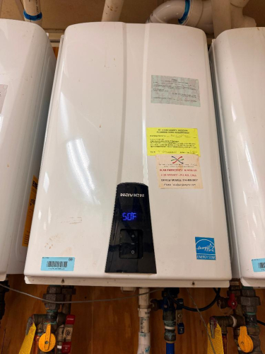 COMMERCIAL WALL-MOUNTED CONDENSING TANKLESS WATER HEATER WITH DIGITAL TEMPERATURE DISPLAY, FRONT-MOUNTED CONTROLS AND ENERGY STAR RATING