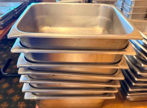 (7) HALF SIZE STAINLESS INSERTS.(HEAVY GAUGE STAINLESS)