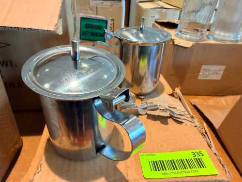 (6) STAINLESS CREAMER DECANTERS.