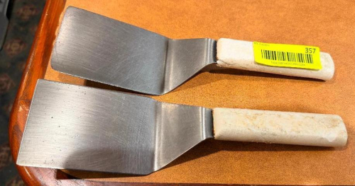 (2) STAINLESS TURNERS.