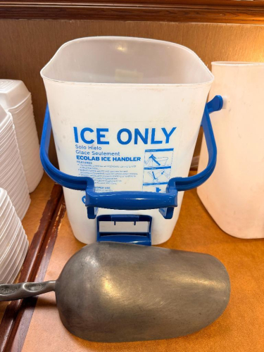 PLASTIC ICE BUCKET AND LARGE METAL SCOOP.