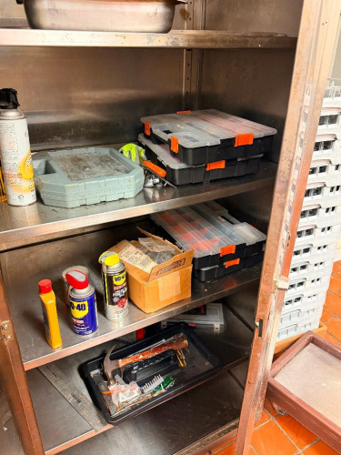CONTENTS OF STORAGE CABINET - ASSORTED TOOLS AND TOOL BOXES.