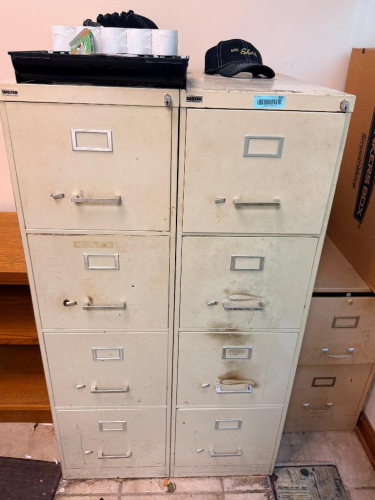 (2) FOUR DRAWER METAL FILE CABINETS.