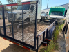 TANDEM-AXLE STEEL UTILITY TRAILER WITH MESH RAMP GATE & SIDE RAILS - 10
