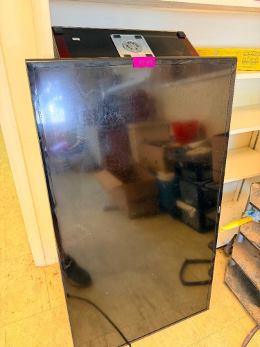 (1) LARGE FLAT SCREEN TV