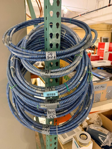 SEVERAL BUNDLES LOT OF FLEXIBLE METAL ELECTRICAL CONDUIT - APPROX 150 LINEAR FT.
