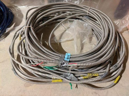 SEVERAL BUNDLES LOT OF FLEXIBLE METAL ELECTRICAL CONDUIT - APPROX 200 LINEAR FT.
