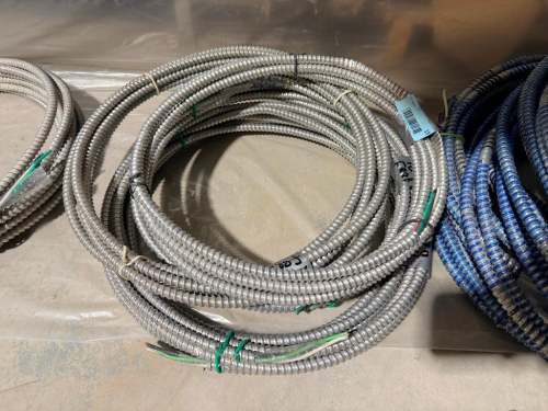 SEVERAL BUNDLES LOT OF FLEXIBLE METAL ELECTRICAL CONDUIT - APPROX 100 LINEAR FT.