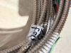 SEVERAL BUNDLES LOT OF FLEXIBLE METAL ELECTRICAL CONDUIT - APPROX 100 LINEAR FT. - 2