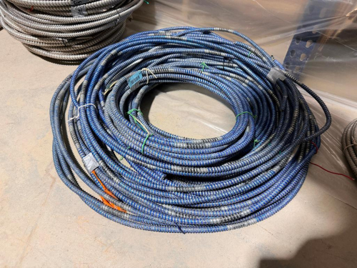 SEVERAL BUNDLES LOT OF FLEXIBLE METAL ELECTRICAL CONDUIT - APPROX 200 LINEAR FT.