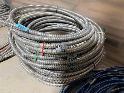 SEVERAL BUNDLES LOT OF FLEXIBLE METAL ELECTRICAL CONDUIT - APPROX 150 LINEAR FT.