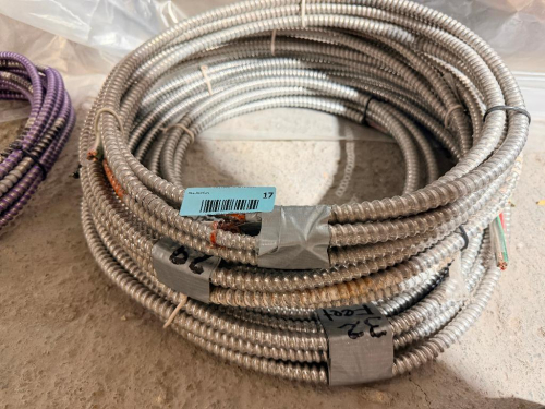 SEVERAL BUNDLES LOT OF FLEXIBLE METAL ELECTRICAL CONDUIT - APPROX 100 LINEAR FT.
