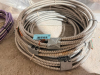 SEVERAL BUNDLES LOT OF FLEXIBLE METAL ELECTRICAL CONDUIT - APPROX 100 LINEAR FT.