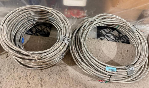 SEVERAL BUNDLES LOT OF FLEXIBLE METAL ELECTRICAL CONDUIT - APPROX 200 LINEAR FT.