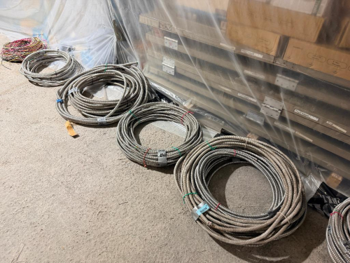 SEVERAL BUNDLES LOT OF FLEXIBLE METAL ELECTRICAL CONDUIT - APPROX 400 LINEAR FT.