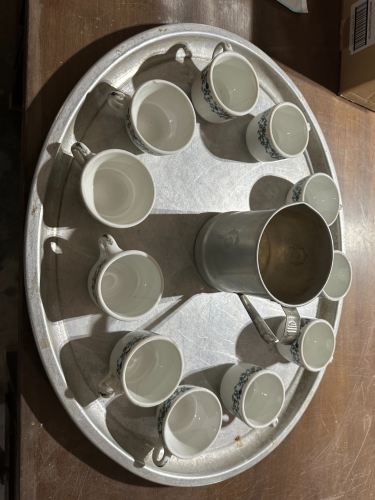 (1) ASSORTED LOT OF PORCELAIN CUPS WITH METAL PITCHER & SERVING TRAY