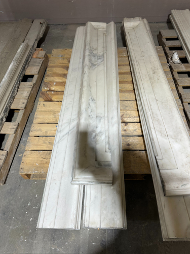 62" WHITE MARBLE DOOR SURROUND WITH MATCHING THRESHOLD AND DECORATIVE TRIM / MOLDING. INCLUDES REMOVED MARBLE COMPONENTS SHOWN. FROM ORIGINAL 1929 BUILDING CONSTRUCTION.