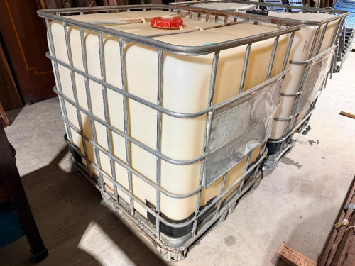 (1) IBC TOTE TANKS WITH METAL CAGES