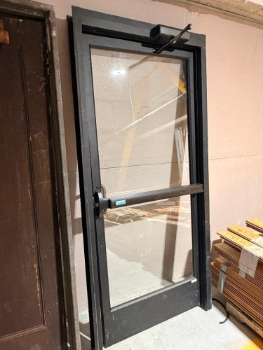 (1) COMMERCIAL GLASS DOOR WITH PANIC BAR & FRAME