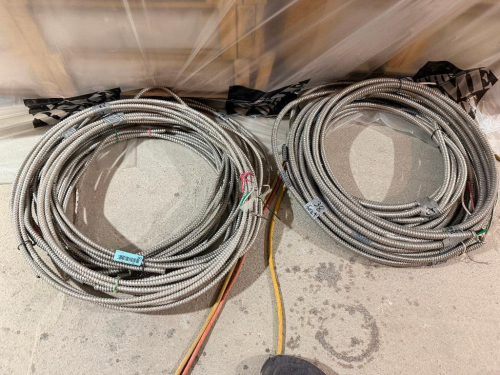 SEVERAL BUNDLES LOT OF FLEXIBLE METAL ELECTRICAL CONDUIT - APPROX 200 LINEAR FT.