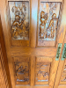 CUSTOM-BUILT SOLID OAK DOUBLE ENTRY DOOR ASSEMBLY WITH EXTENSIVE RELIEF-CARVED WINE AND VINEYARD SCENES, RAISED-PANEL CONSTRUCTION, DECORATIVE BRASS-TONE HARDWARE, HEAVY OAK CASING, AND MATCHING TALL LEADED STAINED-GLASS SIDELIGHTS. DECORATIVE GRAPE AND V - 2