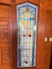 CUSTOM-BUILT SOLID OAK DOUBLE ENTRY DOOR ASSEMBLY WITH EXTENSIVE RELIEF-CARVED WINE AND VINEYARD SCENES, RAISED-PANEL CONSTRUCTION, DECORATIVE BRASS-TONE HARDWARE, HEAVY OAK CASING, AND MATCHING TALL LEADED STAINED-GLASS SIDELIGHTS. DECORATIVE GRAPE AND V - 10