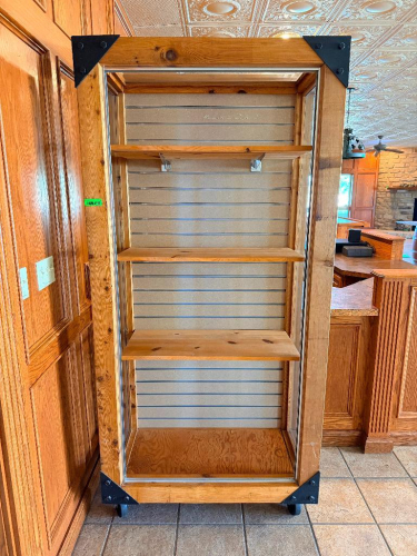 41" CUSTOM-BUILT WOOD AND GLASS DISPLAY CABINET WITH HEAVY TIMBER FRAME, GLASS SIDE PANELS, SLATWALL BACK PANEL, (3) WOOD DISPLAY SHELVES, METAL SHELF BRACKETS, BLACK STEEL CORNER BRACES, AND CASTER BASE.