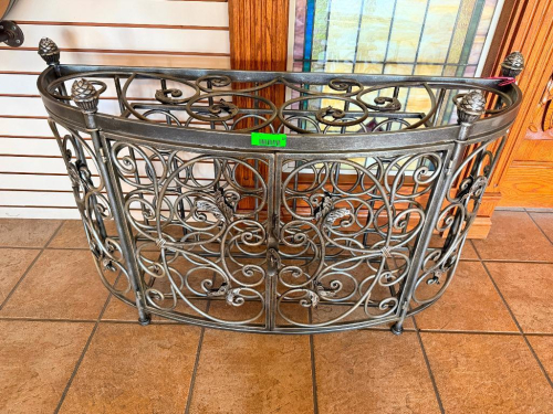 48" W X 17" D DECORATIVE WROUGHT IRON DEMILUNE CONSOLE TABLE BASE WITH ORNATE SCROLLWORK, ACANTHUS LEAF ACCENTS, PINECONE FINIALS AND CURVED FRONT. OPEN METAL FRAME CONSTRUCTION WITH DECORATIVE FRONT AND SIDE PANELS. TABLE TOP NOT INCLUDED.