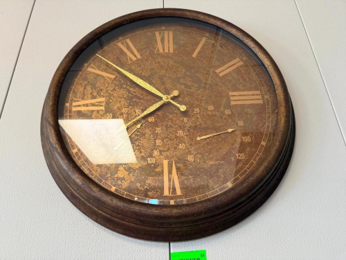 DECORATIVE OVERSIZED WALL CLOCK WITH ROUND DISTRESSED BRONZE/BROWN FINISH FRAME, ROMAN NUMERAL DIAL, GOLD-TONE HANDS, AND INTEGRATED TEMPERATURE AND HUMIDITY GAUGES. INCLUDES DECORATIVE WOOD WINE CRATES AND ARTIFICIAL GRAPE VINE DECOR.