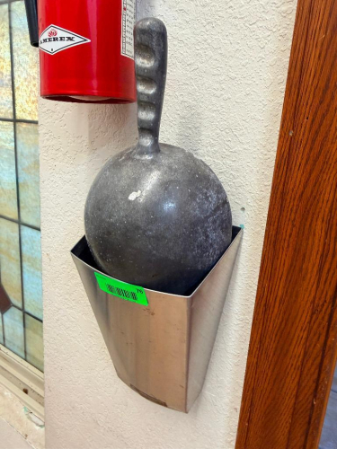 WALL MOUNTED STAINLESS CRADLE AND ICE SCOOP.