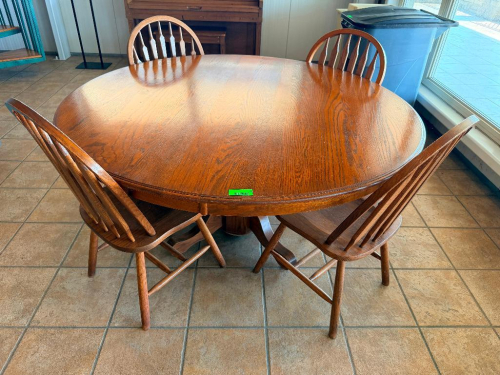 (5) PIECE DINING SET CONSISTING OF (1) 60" SOLID WOOD OVAL DINING TABLE WITH WOOD-GRAIN FINISH (4) MATCHING CHAIRS.