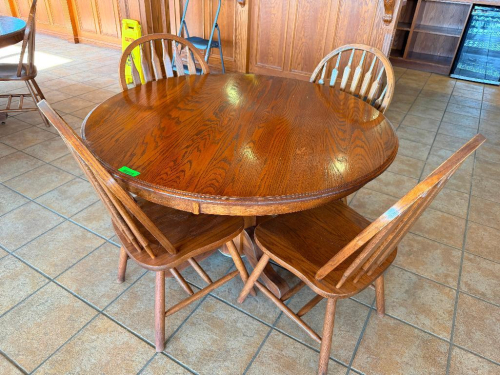(5) PIECE DINING SET CONSISTING OF (1) 48" SOLID WOOD OVAL DINING TABLE WITH WOOD-GRAIN FINISH (4) MATCHING CHAIRS.