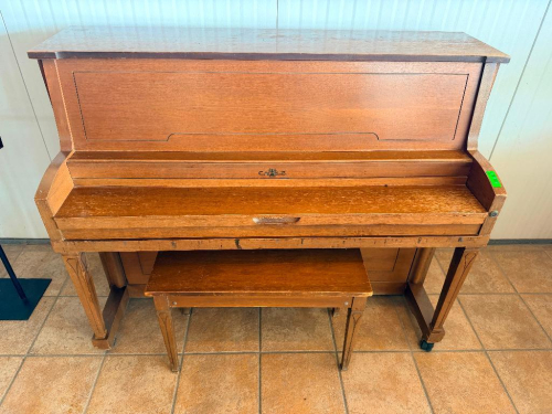 CABLE UPRIGHT PIANO WITH WOOD CABINET, FULL KEYBOARD, CAST-IRON HARP, EXPOSED INTERNAL ACTION, AND MATCHING WOOD PIANO BENCH.