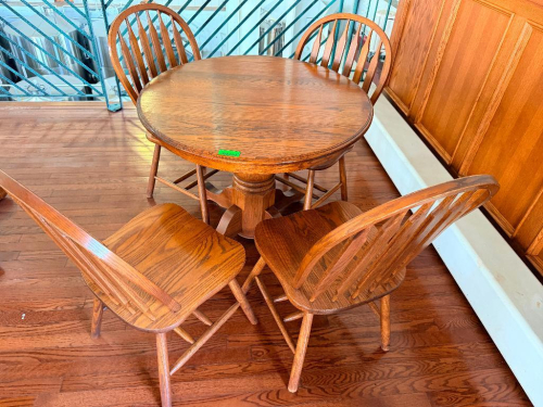 (5) PIECE DINING SET CONSISTING OF (1) 48" SOLID WOOD OVAL DINING TABLE WITH WOOD-GRAIN FINISH (4) MATCHING CHAIRS.