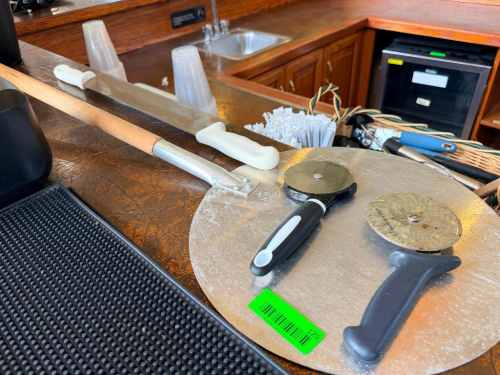 PIZZA PADDLE, (2) WHEELS, AND (1) ROCKER KNIFE.